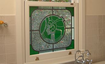 coloured glass white upvc sash window