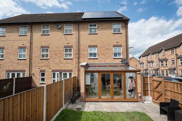 Dual Golden Oak PVCU Leanto with Solaroof Glass Roof