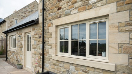 Cream flush casement window product tile from Anglian Home Improvements