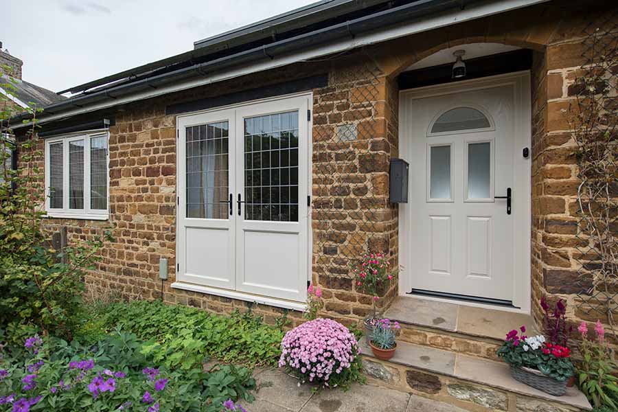 Dual Cream classic composite door with frosted glass panels