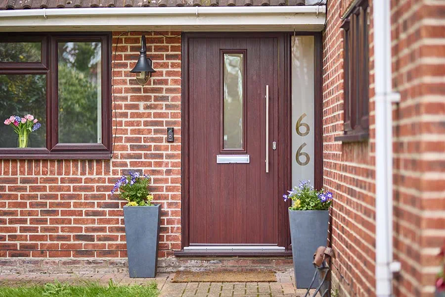 Dark woodgrain elite composite door with Negative etched glass number