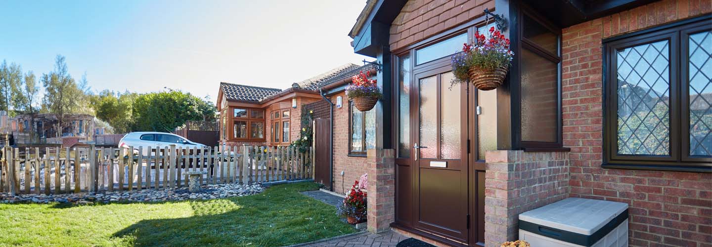 Chocolate brown porch with frosted glass panels banner